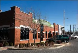  ?? NWA Democrat-Gazette/CHARLIE KAIJO ?? The old Dollar Saver building is shown Thursday in Rogers.