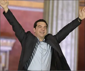  ??  ?? Victorious: Alexis Tsipras hails his party’s historic election win in Athens last night