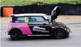  ??  ?? Shanel Drewe after the bonnet on her car flipped up at Brands Hatch