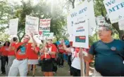  ?? AP PHOTO ?? Teachers from Wisconsin and Minnesota join striking Chicago teachers during a rally Saturday in Chicago.