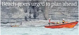  ??  ?? Two lifeboats from Porthcawl rescued two people who had become cut off by the high tide at the foot of cliffs near Southerndo­wn