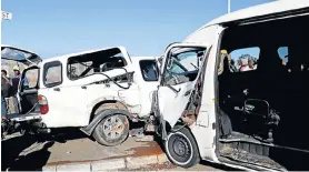  ??  ?? LUCKY ESCAPE: Eighteen schoolchil­dren in this bakkie suffered only minor injuries in the crash