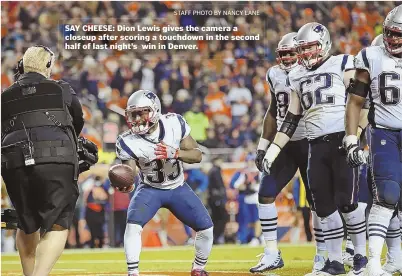  ?? STAFF PHOTO BY NANCY LANE ?? SAY CHEESE: Dion Lewis gives the camera a closeup after scoring a touchdown in the second half of last night’s win in Denver.