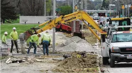  ?? MARSHALL GORBY / STAFF ?? The $2.3 million project along Colonel Glenn Highway includes the installati­on of curbs, sidewalks, a bike path and crosswalks in a 45 mph speed limit zone that averages more than 18,000 vehicles daily with several eateries across the road from the university, City Engineer Lee Harris said.