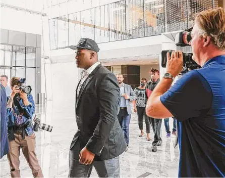  ?? Shafkat Anowar / Dallas Morning News ?? Offensive tackle Tyler Smith, the Cowboys’ first-round pick out of Tulsa, arrives for a news conference on Friday at The Star in Frisco. Smith, who could move to guard to replace departed Connor Williams, committed 16 penalties last season.