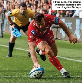  ?? ?? > Ryan Conbeer in scoring action for Scarlets in the match against Ospreys