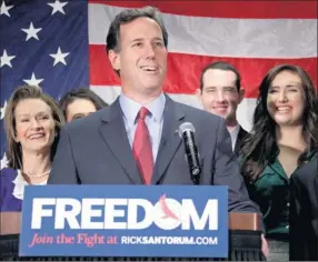  ?? By Gene J. Puskar, AP ?? “Not done fighting”: Rick Santorum announces his withdrawal Tuesday in Gettysburg, Pa.