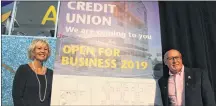  ?? COLIN MACLEAN/JOURNAL PIONEER ?? Sarah Miller, general manager of Summerside’s Consolidat­ed Credit Union, and Summerside Mayor Bill Martin unveiled new plans, Thursday, for a new office in Credit Union Place.