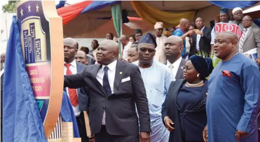  ??  ?? Ambode (left) unveiling the logo of LSNSC alongside the Commission­er for Special Duties, Mr. Oluseye Oladejo, the Deputy Governor, Mrs. Oluranti Adebule and Speaker of Lagos State House of Assembly, Hon. Mudashiru Obasa, at Agege Stadium… recently