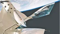  ?? VIRGIN GALACTIC VIA AP ?? A view of Earth from Virgin Galactic’s rocket plane as it reaches an altitude of more than 54 miles during a test flight Thursday.