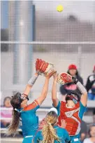  ?? JIM THOMPSON/JOURNAL ?? From left, UNM pitcher Jensen Main, third baseman Kristyn Whitley and catcher Lauren Wilmert converge on pop fly, only to see it drop. That allowed a run to score during the Lobos’ 12-7 loss to New Mexico State.