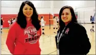  ?? Staff photograph by Lynn Atkins ?? Heather (Henson) Wade and Jessica (Hinton) Woods both have a lot of Pea Ridge athletic wear in their closets. Both graduated from Pea Ridge High School and then returned to teach and coach.