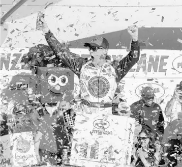  ?? BRIAN LAWDERMILK/GETTY IMAGES ?? The 2014 season Cup champion, Kevin Harvick led 214 of Sunday’s 267 laps in the Pennzoil 400 and celebrated in Victory Lane after holding off a late charge from local favorite Kyle Busch to prevail in Vegas for the second time in four years.
