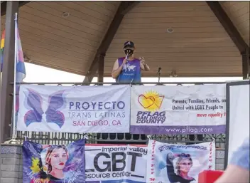  ?? PHOTO VINCENT OSUNA ?? Aaron Castaneda, Marilyn’s cousin, speaks while on stage during the I Am Marilyn: March for Trans Lives event on Saturday in Brawley.