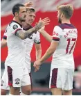  ??  ?? Points made: Southampto­n’s Danny Ings is congratula­ted