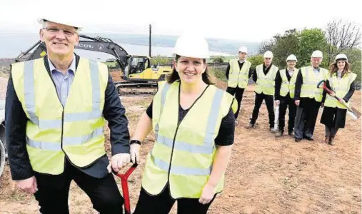  ??  ?? DOING THE SPADE WORK: Robert McAlpine and daughter Kerry are both branching out on new careers at Dalriada Luxury Lodges