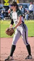  ?? Courtesy of Greenwich ?? Greenwich's Lily Mccauliffe is shown earlier this season. She threw a perfect game last week.