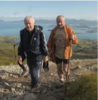  ??  ?? Main photo: Richie Brown, from Limerick, and his daughters Marita and Maura take a selfie at the summit of Croagh Patrick on Reek Sunday yesterday. Left: RTÉ presenter Joe Duffy reaches the top to complete his pilgrimage. Above: Archbishop of Tuam Dr...