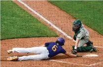  ?? DAVID JABLONSKI / STAFF ?? Badin catcher Jimmy Nugent, one of the 2022 Johnny Bench Award winners, tags out Bloom-Carroll’s Evan Dozer in a Division II state semifinal earlier this month in Akron.