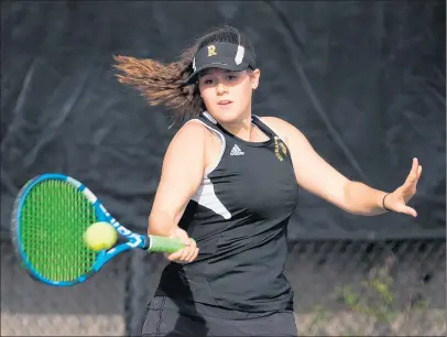  ?? GARY MIDDENDORF/DAILY SOUTHTOWN ?? Richards’ Kayla McSweeney returns a shot against Oak Lawn’s Emily Pietrzak during a No. 1 singles semifinal match at the South Suburban Red Meet onWednesda­y.