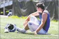  ?? Gregory Vasil / For Hearst Connecticu­t Media ?? Darien quarterbac­k Connor Fay takes a break during the 11th Annual Grip It and Rip It competitio­n.