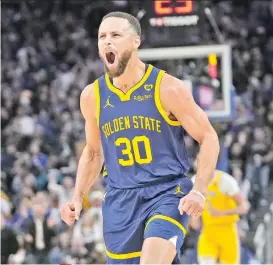  ?? AP PHOTO/JEFF CHIU ?? Golden State Warriors guard Stephen Curry (30) reacts after making a 3-point basket against the Los Angeles Lakers during the first half of an NBA basketball game in San Francisco, Thursday, Feb. 22, 2024.