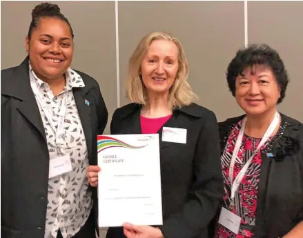  ?? Photo: DEPTFO News ?? Olivia Tawaqa (left) and Jenny Seeto (right) with a DEIA official while receiving the Full Licence at Ghana.