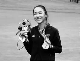  ?? MATT YORK/AP ?? Lydia Ko, a native of New Zealand, won the the bronze medal during the 2020 Summer Olympics in Japan.