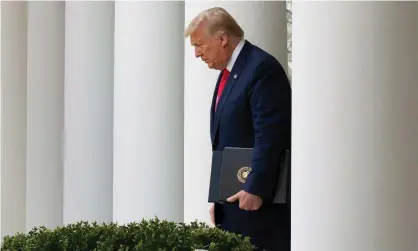  ??  ?? Donald Trump arrives to speak at a press conference on the coronaviru­s at the Rose Garden of the White House in Washington DC, on 13 March. Photograph: Stefani Reynolds/EPA