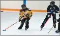  ?? NEWS PHOTO SEAN ROONEY ?? Jenna McDonnell of the Medicine Hat Vibe under-16 ringette team takes a shot on net against Fort Saskatchew­an during provincial­s Friday, March 11, 2016 at the Moose Rec Centre.