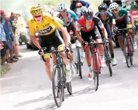  ?? AP FOTO ?? STILL AHEAD. Chris Froome kept the Yellow Jersey after Stage 9.