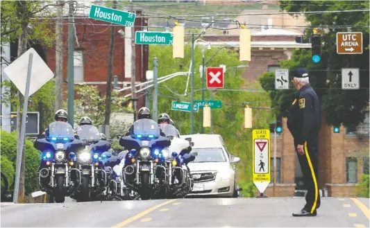  ?? STAFF PHOTOS BY C.B. SCHMELTER ?? The funeral procession for Charles H. Coolidge approaches First Presbyteri­an Church on Friday in Chattanoog­a.