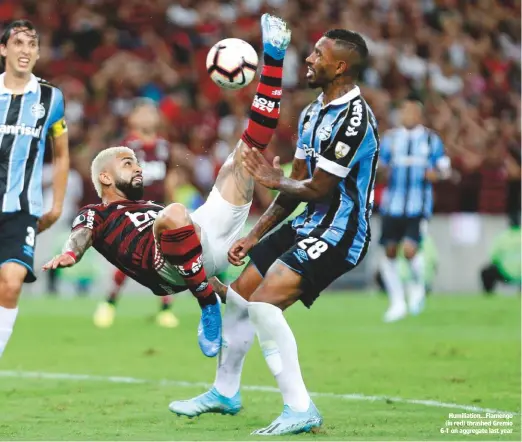  ??  ?? Humiliatio­n...Flamengo (in red) thrashed Gremio 6-1 on aggregate last year