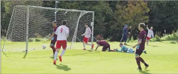  ??  ?? Ruaridh Horne’s cross finds its way into the net off the head of St Johns defender Craig Rattray for Saints’ second goal.