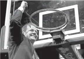  ??  ?? MTSU basketball head coach Kermit Davis celebrates winning the Conference USA regular season title two years in a row by beating Western Kentucky 82-64 on March 1. PHOTOS BY HELEN COMER/DNJ AND BRENT BEERENDS/MTSU ATHLETICS