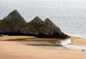  ??  ?? ●● Jason North and his family were at the beach at Three Cliffs Bay in Gower, near Swansea