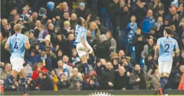  ?? Agence France-presse ?? Manchester City’s Raheem Sterling (centre) celebrates after scoring against Watford during their EPL match.