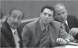  ?? TRIBUNE NEWS SERVICE ?? Scott Peterson, center, with defense attorneys Mark Geragos, left, and Pat Harris, listens to judge Alfred A. Delucchi in a Redwood City courtroom in 2004. A judge in the Kristin Smart case has barred testimony from Peterson, who is currently incarcerat­ed at San Quentin for the murder of his wife, Laci Peterson, and their unborn child.