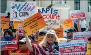 ?? AP FILE PHOTO BY J. SCOTT APPLEWHITE ?? In this file photo, immigratio­n activists rally outside the Supreme Court as the justices hear arguments over the Trump administra­tion’s plan to ask about citizenshi­p on the 2020 census, in Washington.