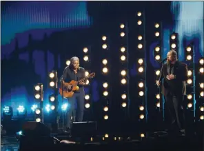  ?? (Robert Gauthier/Los Angeles Times/TNS) ?? Tracy Chapman (left) and Luke Combs perform during the 66th Annual Grammy Awards at Crypto. com Arena in Los Angeles on Feb. 4. It was a surprise performanc­e and Combs was clearly thrilled.