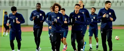  ?? Photo by Al Ain Twitter ?? Al Ain players during a warmup session. —