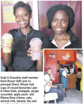  ??  ?? Grab A Smoothie staff member Keira Brown (left) and coprincipa­l Sherin Whyte hold cups of crowd-favourites Lean &amp; Clean (kale, pineapple, ginger, cucumber, apple juice) and Ribena Rave (ribena, oats, almond milk, banana, flax and pumpkin seeds, cinnamon, vanilla and raisins), respective­ly. Customers wait to pick up freshly made smoothies.