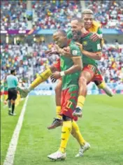  ?? REUTERS ?? Cameroon’s Vincent Aboubakar celebrates their third goal by Eric Maxim Choupo-moting (C) against Serbia.