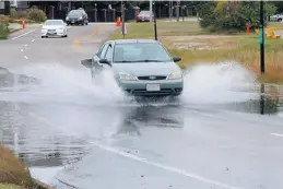  ?? D. MALMQUIST/VIRGINIA GAZETTE ?? We can see the water is climbing up the coasts and that nuisance flooding, also known as blue-sky flooding, is more intrusive and frequent than ever before.