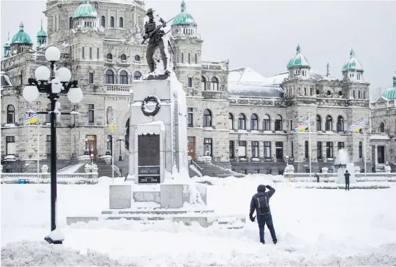  ??  ?? The legislatur­e was a hive of activity inside on Tuesday during the B.C. government’s throne speech, while outside was serene and scenic amid the snow.