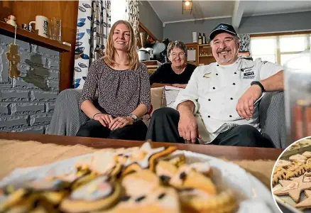  ??  ?? Belinda Lubkoll-Young, of Ringcraft Moana, left, and Okato’s Stony River Hotel’s Renate and Heimo Staudinger with some of the gingerbrea­d cookies that will be available at this weekend’s Christkind­lesmarkt at the hotel. Organisers of the festival...