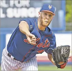  ??  ?? Zack Wheeler is back in the mix thanks to strong spring and hand injury to Jason Vargas (opposite r.), who will have surgery on nonthrowin­g hand Tuesday. GETTY