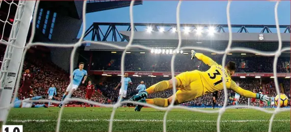  ?? REUTERS ?? Flying start: Alex Oxlade-Chamberlai­n fires a low shot beyond Ederson for the opener in a seven-goal thriller