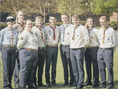  ?? ?? HONOUR Hampshire Scouts received the Queen’s Scout Award from Chief Scout Bear Grylls, inset below