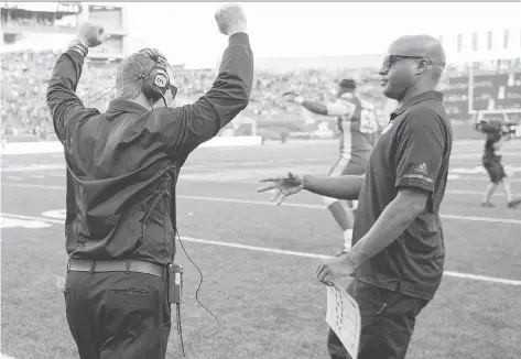  ?? TROY FLEECE ?? Saskatchew­an Roughrider­s head coach and general manager Chris Jones, shown celebratin­g a victory over the visiting Toronto Argonauts on July 29, will be rejoicing once again on Sunday in Toronto when they play in the East Division final, according to...